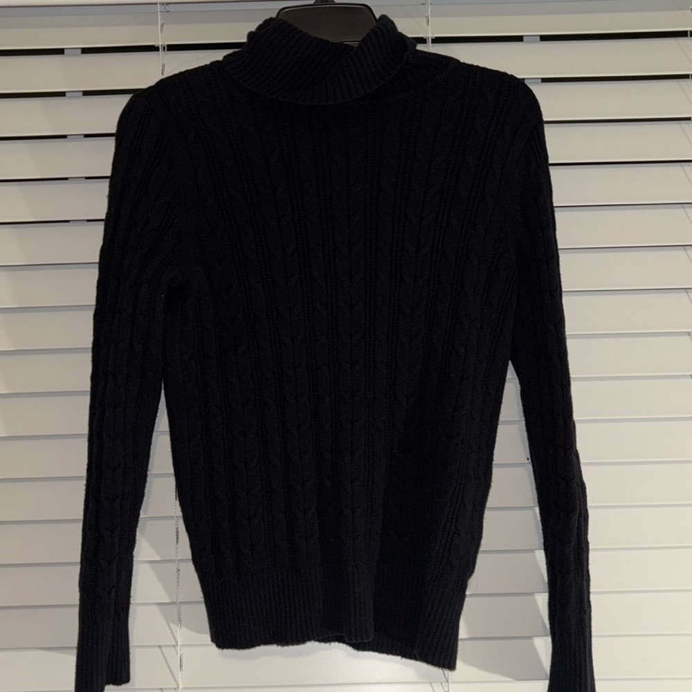 Rich black St. John’s Bay turtle neck. Medium fit with a comfortable stretch!